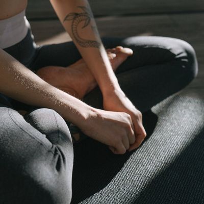 A close-up of yoga mat texture in a calm room.